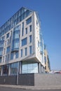 fragment of a modern apartment building. the concept of providing housing, buying an apartment or renting out. blue sky.