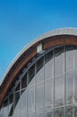 Fragment of modern building with structural glass wall