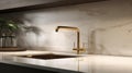 Fragment of a modern classic luxury kitchen. White marble countertop with built-in sink, gold faucet, marble backsplash Royalty Free Stock Photo