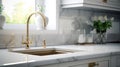 Fragment of a modern classic luxury kitchen with window. White marble countertop with built-in sink, curved gold faucet Royalty Free Stock Photo