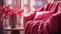 Fragment of a modern cozy living room in pink tones. Branches with pink leaves in a vase standing on a table against the Royalty Free Stock Photo