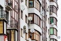 a fragment of a modern home with satellite dishes and air conditioners Royalty Free Stock Photo