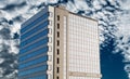 A fragment of a modern office building with glass facades Royalty Free Stock Photo