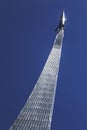 Fragment of the monument in memory of achievements of the Soviet people in space exploration against the blue sky, Moscow