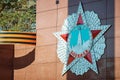 Fragment of the monument on Victory Square. Soviet military award for victory in the Great Patriotic War. Orange black