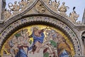 fragment of a mosaic in St. Mark's Basilica in the evening with tourists in Venice in September 2023