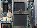 Fragment of the motherboard of a mobile phone with a processor