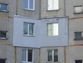 A fragment of a multi-storey concrete panel residential building with an externally applied external insulation on the Royalty Free Stock Photo