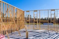 Fragment of a new home under construction wood framing beams