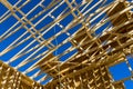 Fragment of a new home under construction wood framing beams