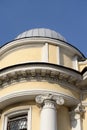 Fragment of an old building in the classical style in the center of St. Petersburg. Royalty Free Stock Photo