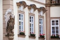 Fragment of an old building with flowers Royalty Free Stock Photo