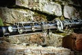 Fragment of an old dirty clarinet. Selective focus Royalty Free Stock Photo