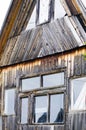 Fragment of an old house with a window. Russia