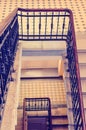 A fragment of an old marble staircase and a railing. Toning in the style of instagram Royalty Free Stock Photo