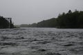 Fragment of the old railway bridge over the river in the fog Royalty Free Stock Photo