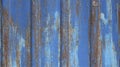 Fragment of an old rustic fence of blue-brown color Royalty Free Stock Photo
