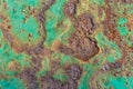 Fragment of old rusty metal surface with peeled paint. Textured background. Royalty Free Stock Photo