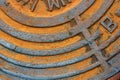 Fragment of an old rusty sewer hatch. Royalty Free Stock Photo