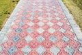 Fragment of old stone and tile pavement surface texture