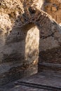 Fragment of old wall with an arch Royalty Free Stock Photo