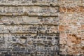 Fragment of an old wall with brickwork of different bricks on the 16th century Medici Chapel Capelle Medicee in Florence, Italy