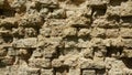 Fragment of an old wall of crumbling white lime brick. For the background. Royalty Free Stock Photo