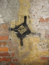 Fragment of old wall texture with peeling paint graffiti Royalty Free Stock Photo
