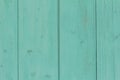 A fragment of an old wooden door or wall of blue or turquoise color Royalty Free Stock Photo