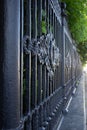 Fragment of old wrought iron fence isolated. Royalty Free Stock Photo