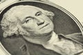 A fragment of one dollar bill with a portrait of President