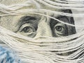 Fragment of one hundred dollar bill with a portrait of Benjamin Franklin, eye Royalty Free Stock Photo