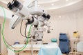 Fragment of ophthalmic laser system in eye surgery clinic. Selective focus, close up. Royalty Free Stock Photo