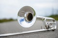 Fragment outdoor lying trombone closeup Royalty Free Stock Photo