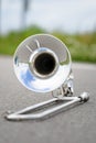 Fragment outdoor lying trombone closeup Royalty Free Stock Photo