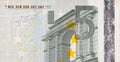 Fragment part of 5 euro banknote close-up with small brown details