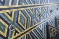 Fragment of a patterned tiled roof of St. Stephen's Cathedral Stephansdom in Vienna, Austria. January 2022 Royalty Free Stock Photo