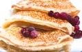 Fragment of a pile of pancakes with red berries of a cranberry Royalty Free Stock Photo