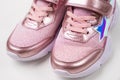fragment pink shiny sneakers. Stylish fashionable bright shoes for girls