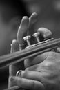 Fragment of a pipe in the hands of a musician