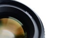 Fragment of a portrait lens for a modern SLR camera. A photograph of a wide-aperture lens with a focal length of 50mm isolated on Royalty Free Stock Photo