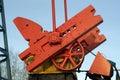 Fragment of pumpjack over an oil well