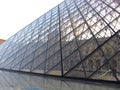 Fragment of the pyramid and water fountain of the Louvre Museum Paris France