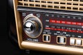 Fragment of radio receiver in retro style with radio dial and silver buttons Royalty Free Stock Photo