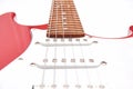 Fragment of a red electric guitar on a white background. Part of the guitar. Music object Royalty Free Stock Photo