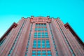 Architectural background of a fragment of the facade of a Soviet building in Kiev against a blue sky Royalty Free Stock Photo