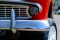 Fragment of red retro car on the road Royalty Free Stock Photo