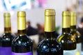 A fragment of red wine bottles. Trade in alcoholic beverages in the store Royalty Free Stock Photo