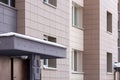 Fragment residential apartment with flat building exterior. Detail of New luxury house and home complex Royalty Free Stock Photo