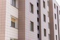 Fragment residential apartment with flat building exterior. Detail of New luxury house and home complex Royalty Free Stock Photo